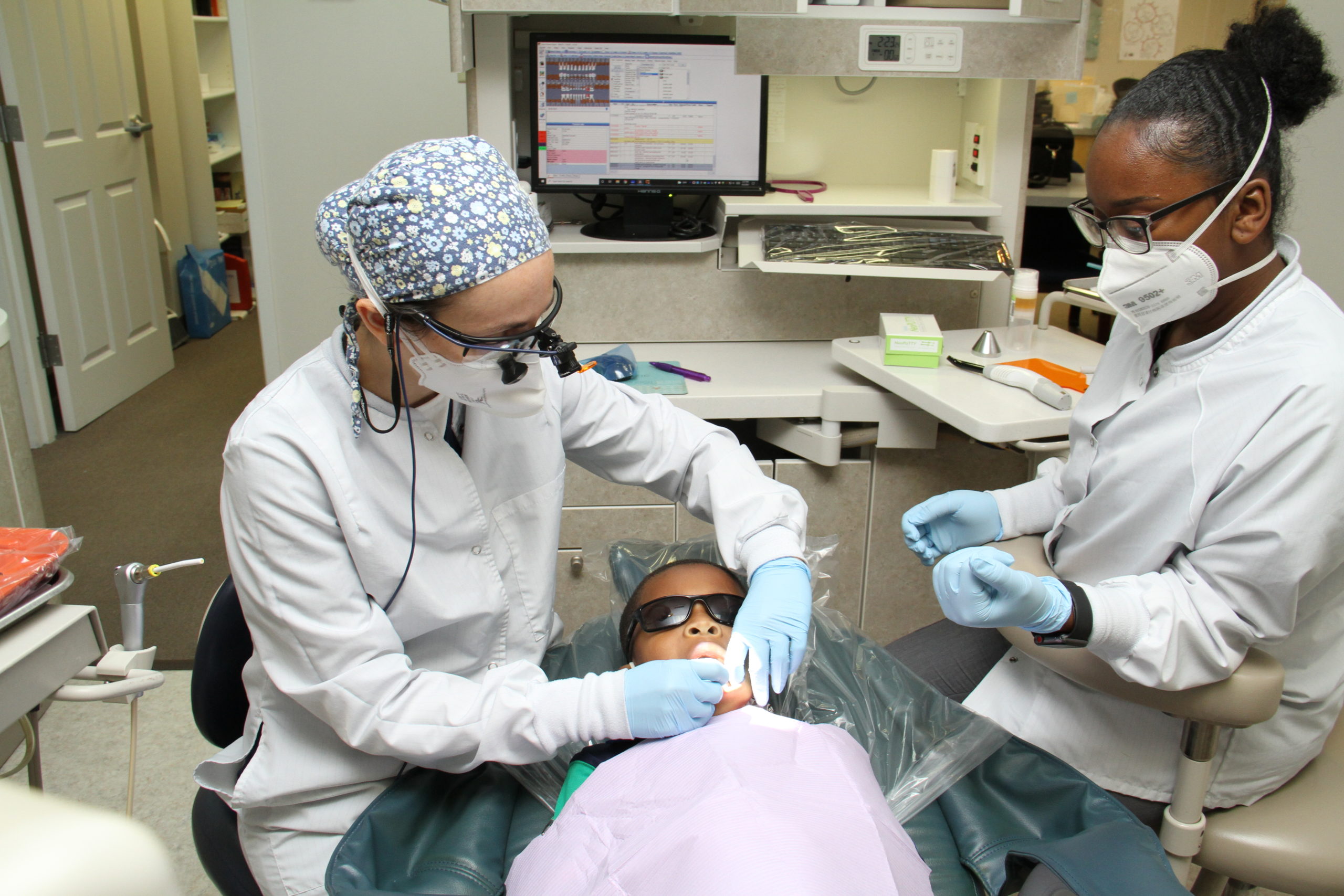Dr. Goldenhersh treating a child - Family dentist in University City